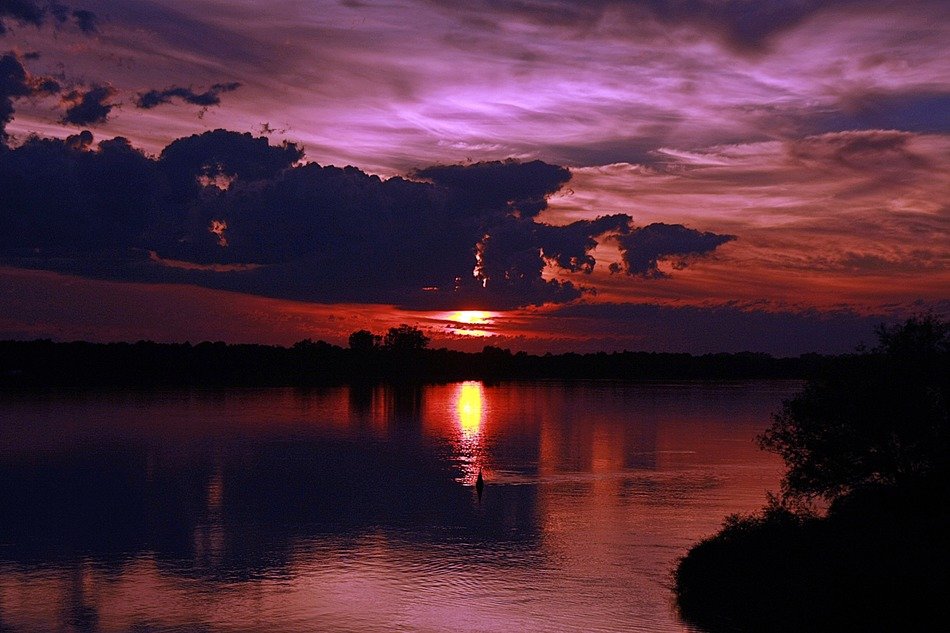 Landscape with the sunshine on the water at dusk
