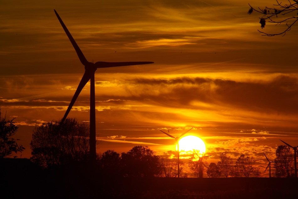 wind turbine in countryside at sunset