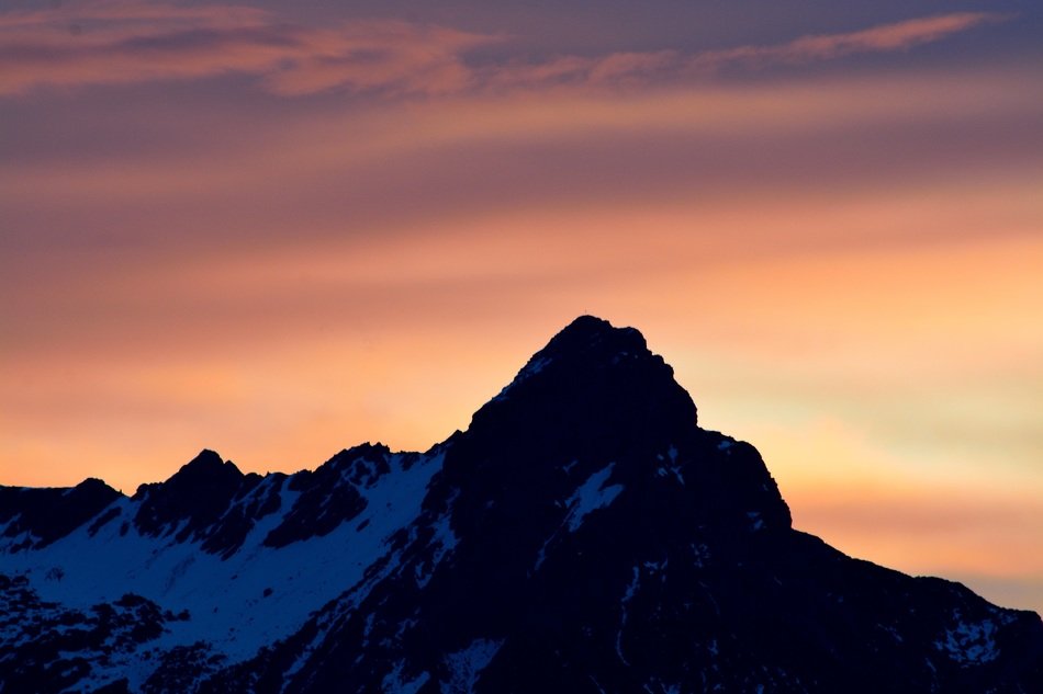 snow mountain peak orange sky view