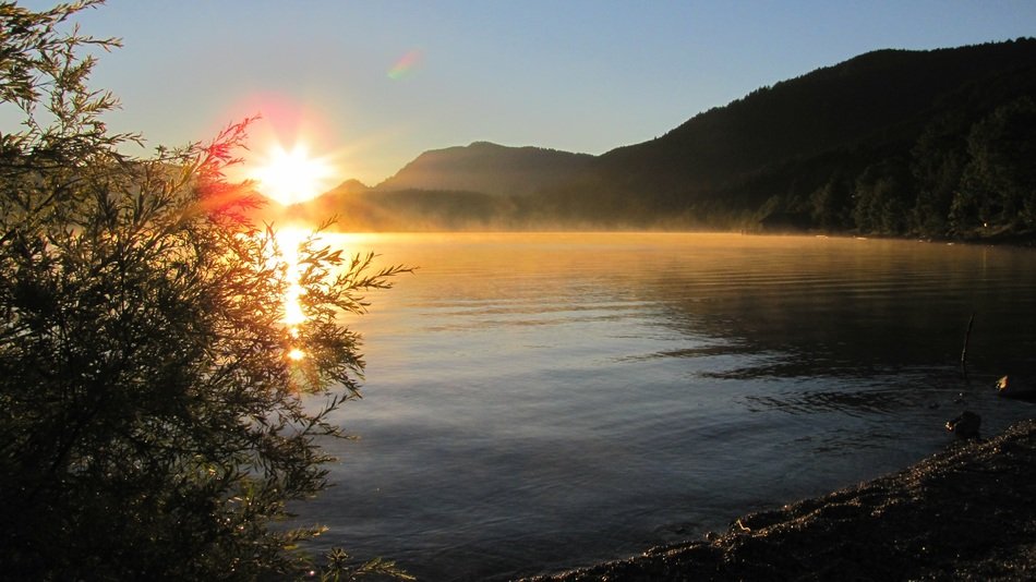 sunrise over the mountains near the lake