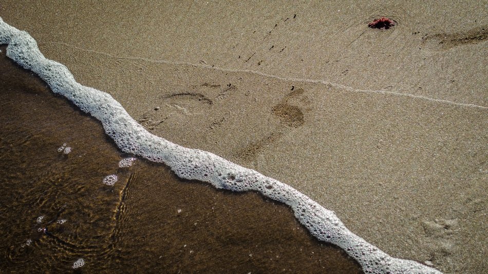 Waves on the sand on the beach