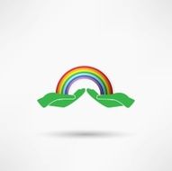 hands on background of the colorful rainbow