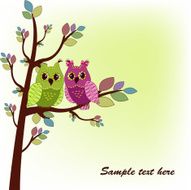 The two owls sitting on tree