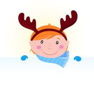 Cute Christmas kid in reindeer costume with blank banner sign