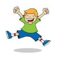 Boy jumping while smiling
