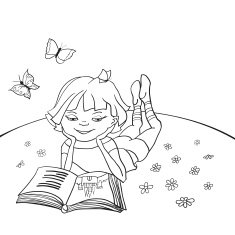 Little girl is reading a fairytale on meadow