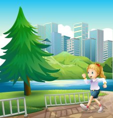 girl running at the riverbank with a tall pine tree