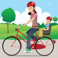 Mother riding with child on bicycle