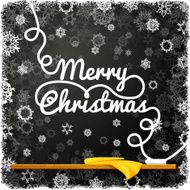Merry christmas message written on the black school chalkboard with