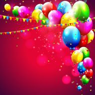 Colorful birthday balloons on red background