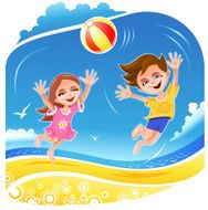Boy and girl playing with ball on the beach