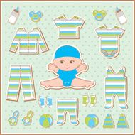 Scrapbook elements with baby clothes