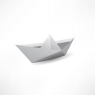 Origami paper ship isolated on white background