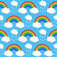 Seamless pattern with rainbows and clouds on a blue background