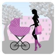 Young woman walking in park with stroller