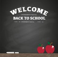 Red apple with rubbed out chalkboard