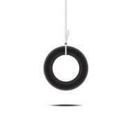 Car tire hanging on rope