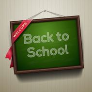 Back to school written on blackboard with chalk N3