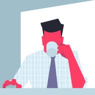 Businessman sitting in front of computer and drinking