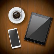 Smartphone and tablet mockup template coffee cup on wood background