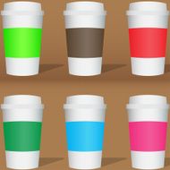 Set of colored mugs with shadow on brown background
