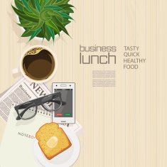 Office desk with computer burger coffee and laptop