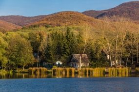 Beautiful house near the lake among nature
