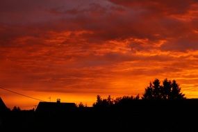 silhouette of a village at sunset