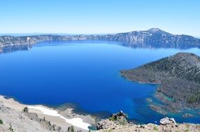 crater lake with blue water peaceful scene