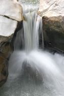 waterfall on large stones close up