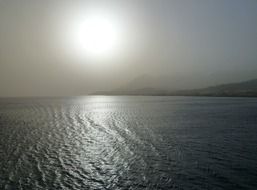 silver sea at sunset in Greece