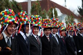 boys in funny carnival hats