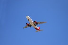 White Airplane in blue sky