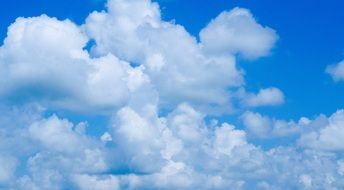 White fluffy clouds on a blue sky