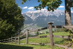 wooden fence on a mountain in the alps