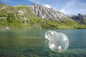 attraction on the lake in the mountains