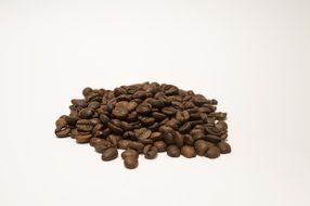 brown coffee beans on white background
