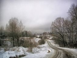 country road in the snow in Russia