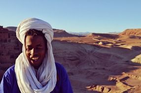 Nomad in the Morocco desert in light and shadow