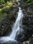 scenic mountain river stream with water fall, france, alps