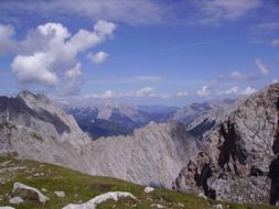 white clouds above high mountains in Austria