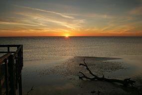 Landscape of calm ocean at the sunset