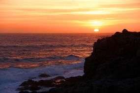 orange sunset over bodega bay