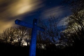 Wooden cross in the dark