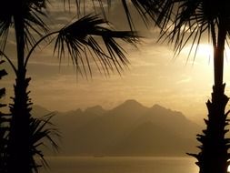 scenic rocks on sea coast at sunset, turkey, antalya