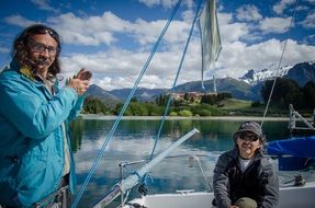 men on the sailing boat