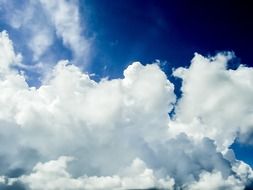 Deep foam clouds in the blue sky