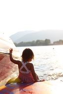 Baby on a boat on a sunny day