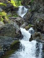 water cascade in the alps in france