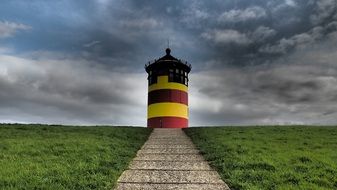 yellow red lighthouse in the east frisia